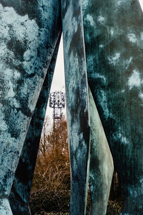 This powerful photograph showcases the vibrant patina on Neil and Auriol Lawson Baker’s The Flame.